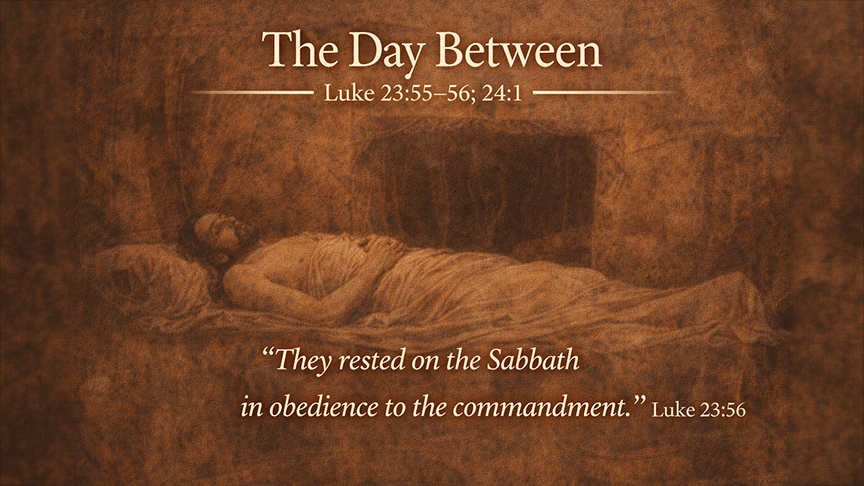 The Day Between — A wide 16:9 photo-realistic image of a sealed stone tomb at dawn in a quiet garden, with muted light and a still atmosphere.